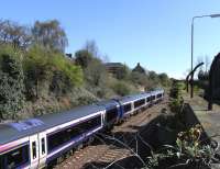 A northbound express rushes through the site of Sinclairtown station on 11 April 2009<br><br>[David Panton 11/04/2009]