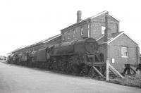 Scene on the reception roads alongside the old goods shed at Barry in October 1967 with a depressed looking 9F nearest the camera. The locomotives are thought to be (from left to right) 71000 <I>Duke of Gloucester</I>, 75014, 42765 and 92134. [See image 40325]<br><br>[K A Gray 22/10/1967]