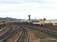 47823 is on the rear of the Royal train after reversing at Wakefield Kirkgate station in order to access the branch to Westgate on 27 March 1992. At the far end of the train 47835 leads the way.<br><br>[David Pesterfield 27/03/1992]