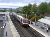 A Glasgow - Alloa service, formed by 170 474, calls at Croy on 29 April 2009.<br><br>[David Panton 29/04/2009]