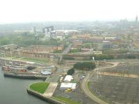 Class 320 and Class 334 units pass each other just to the West of Finnieston West Junction on 15th April 2009. The picture was taken from the top of the Glasgow Science Centre Tower<br><br>[Graham Morgan 15/04/2009]