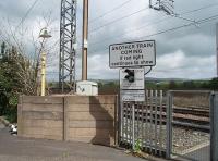 The only artefact of Brock station that still existed after electrification was this elderly lamp standard by the foot crossing (and a decapitated one on the far side). The crossing was remodelled for 125mph trains and for some time was the only one between Preston and Lancaster. In 2014 however, like all the others before it, the Brock crossing was replaced by a footbridge.<br><br>[Mark Bartlett 01/05/2009]