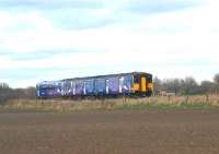 150224 and 153331 forming a 3-car train photographed in the Ulnes Walton area between Midge Hall and Croston on 4 April 2009 with the 1710 hrs Preston to Ormskirk service.<br><br>[John McIntyre 04/04/2009]