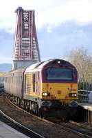 EWS 67003 brings a returning Fife Circle commuter train into Dalmeny on 4 May 2009<br><br>[Bill Roberton 04/05/2009]
