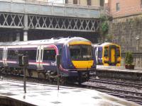 170416 and 158709 at a wet Glasgow Queen Street on 5th May 2009<br><br>[Graham Morgan 05/05/2009]