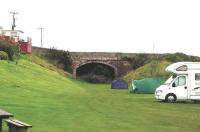 Bridge spanning the former route of the ECML at Marshall Meadows, near Lamberton, north of Berwick-upon-Tweed in 2004. The bridge has since been demolished and the area landscaped.<br><br>[Colin Miller //2004]