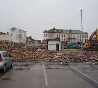 For forty five years after Blackpool Central closed in 1964 the excursion platforms' toilet block continued in use alongside the car park built over the old platforms. It too was demolished however in 2009 and the last remnant is seen here being cleared prior to redevelopment.<br><br>[Mark Bartlett 05/05/2009]