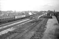 A western region <I>Warship</I> takes a train from Birmingham through Sudbury and Harrow Road station towards London in the 1960s. Final destination on this occasion was Marylebone as opposed to the normal Paddington due to engineering activity affecting the latter. The train is thought to be the 1140 ex-Birmingham New Street. [Editors note: This is the second of the 2 images taken at this location which were eventually identified by members of the Great Western Society... many thanks.] <br>
<br><br>[Robin Barbour Collection (Courtesy Bruce McCartney) //]