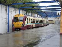 334 018 waits in the rain at Gourock platform 3 on 6 May 2009.<br><br>[David Panton 06/05/2009]