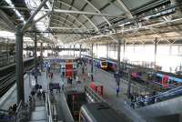 The South side of Leeds station seen from the footbridge on 22 April. View is east towards York with First TransPennine services for Hull and Liverpool Lime Street standing at platforms 15 and 16.<br><br>[John Furnevel 22/04/2009]