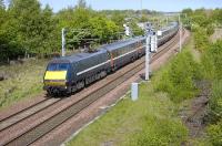 A southbound National Express East Coast service passes the remains of the sidings that led to the former opencast coal loading point at Blindwells on 10 May 2009. Coal from Blindwells was used primarily by the nearby Cockenzie power station.<br>
<br><br>[Bill Roberton 10/05/2009]