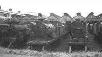 Photograph showing the rear of Perth shed, thought to have been taken early in 1963. The locomotives in the photograph had all been officially withdrawn by December of 1962 and were at that time awaiting disposal. This eventually occurred, in all three cases, during the Autumn of 1963, with 40150 going to Wards of Inverkeithing, 54482 to Arnott Young, Troon, and 44328 to Cowlairs.<br>
<br><br>[Gary Straiton Collection //1963]