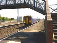 150 261 pulls into Pilning station, South Gloucestershire, on 21 April 2009. From here it will head west through the Severn Tunnel en route to Cardiff.<br><br>[Peter Todd 21/04/2009]