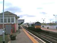 DRS Class 66 heads an intermodal freight north through Stonehaven.<br><br>[John Robin 13/05/2009]