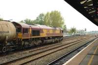 EWS 66013 heads north through the down centre road at Oxford on a tanker train on 13 May 2009.<br>
<br><br>[Peter Todd 13/05/2009]