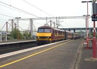 EWS 90035 runs into Birmingham International on 13 May with the Virgin Trains 1203 London Euston - Birmingham New Street.<br><br>[Peter Todd 13/05/2009]