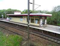 The 1960 Hyndland station building, with panelled wood exterior, seen on 2 May 2009. The ticket office is currently closed for refurbishment.<br><br>[David Panton 02/05/2009]