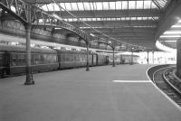 View from the buffer stops at Gourock in March 1966 as a DMU prepares to leave for Glasgow. For a similar view in 2012 [see image 39047]. <br><br>[Colin Miller 22/03/1966]