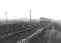 View west from alongside Cart Junction signal box in April 1969 as a DMU from Glasgow Central turns north west and heads for Kilmacolm.<br>
<br><br>[Colin Miller /04/1969]