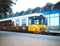 BRCW class 104 2-car DMU no 104 325, repainted in unique maroon and white livery for use on the Oban line in the mid 1980s. The unit became affectionately known as <I>The Mexican Bean</I> and is seen here at Oban in 1985. <br>
<br><br>[Alistair MacKenzie //1985]