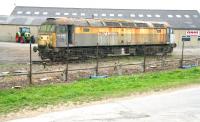 Privately preserved (?) class 47 no 47540 (ex D1723) on the site of the former Sinderby station (now occupied by an agricultural equipment company) in North Yorkshire on 24 April 2009. The locomotive, which once carried the name <I>The Institution of Civil Engineers</I>, was withdrawn from Old Oak Common in May 1998. [Addendum: On 22 May 2009, four weeks after this photograph, the locomotive was removed on a low-loader bound for the Wensleydale Railway at Leeming Bar.] [Finale: The stripped out shell was moved from the Wensleydale Railway to Thompsons scrap yard in Stockton-on-Tees during March 2016 and cut up in early April]. (With thanks to David Pesterfield)<br><br>[John Furnevel 24/04/2009]