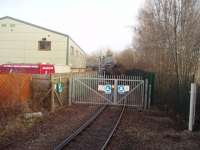 An operational railfreight terminal. This is the bitumen unloading siding at Preston Dock, viewed from a passing Ribble Steam Railway train. Out of use for many years the facilities were refurbished with a government grant and now receive three large tanker trains a week from the Lindsey Oil Refinery near Immingham, hauled from the exchange sidings by the RSR's own diesel locomotives. The tanks in the picture will have arrived on Friday's train for unloading in this siding and then be tripped back to the exchange sidings for collection by the Monday working.<br><br>[Mark Bartlett 06/02/2010]