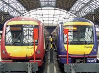 170470 and 170402 at the buffer stops at Glasgow Queen Street's platforms 4 & 5 on 5th May 2009<br><br>[Graham Morgan 05/05/2009]