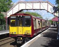 A Glasgow Central - Neilston service photographed at Williamwood on 22 May 2009. Unit 314207.<br>
<br><br>[John Steven 22/05/2009]