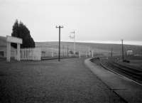 <I>The long wait...</I> view from the down platform at Riccarton Junction one evening in 1968. The only sign of life - the light in the south box.<br><br>[Robin Barbour Collection (Courtesy Bruce McCartney) //1968]