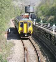 The Northern trains 1038 Middlesbrough - Whitby service has just pulled away from platform 1 at Grosmont on 20 April and is running alongside the rear of the NYMR platform 2 as it accelerates away towards the coast. <br>
<br><br>[John Furnevel 20/04/2009]