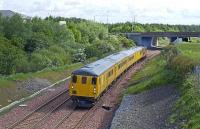 <i>DBSO 9701</i>, with a Class 31 locomotive propelling, passes the site of Bangour Junction on 26 May 2009 with a test train to Bathgate. <br><br>[James Young 26/05/2009]