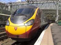 390025 at platform 2 of Glasgow Central on 19 May waiting to depart on a service to London Euston.<br><br>[Graham Morgan 19/05/2009]