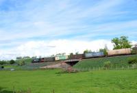 DRS 66 428 heads a Grangemouth-Aberdeen container train past St Vigeans just north of Arbroath in May 2009.<br><br>[Sandy Steele /05/2009]