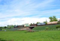 DRS 66 428 heads a Grangemouth-Aberdeen container train past St Vigeans just north of Arbroath in May 2009.<br><br>[Sandy Steele /05/2009]