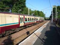 Lanark bound 334 005 departs from Blantyre on 29 May.<br><br>[John Steven 29/05/2009]