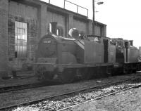 A McIntosh 2P 0-4-4T, no 55267, stands alongside the shed at Greenock Ladyburn, thought to have been photographed in 1960. The locomotive was withdrawn from 66D in October the following year and cut up at Arnott Young, Carmyle, in January of 1963.<br><br>[K A Gray //1960]