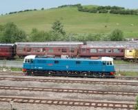 The immaculate, main line registered, 86259 <I>Les Ross</I> lays over in the sidings at Carnforth having brought in a special from Milton Keynes, which was taken forward to Ravenglass by 5690 <I>Leander</I>. The electric loco was scheduled to haul the return leg later in the day. West Coast Railway Company stock awaiting restoration can be seen in the depot sidings behind the locomotive.<br><br>[Mark Bartlett 30/05/2009]