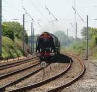 6233 <I>Duchess of Sutherland</I> heads the <I>Royal Scot</I> special train from Crewe to Carlisle approaching Hest Bank level crossing on 30 May 2009 (and doing a lot more than 45mph - that sign is for the chord to Bare Lane to the right of the Pacific) [See image 28004].<br><br>[Mark Bartlett 30/05/2009]