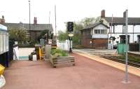 Platform view at Starbeck on 24 April looking over High Street level crossing in the direction of Knaresborough. Opened in 1848 by the Leeds and Thirsk Railway the station was named Harrogate until 1857.  Beyond the signal box stood Starbeck shed, latterly carrying the code 50D. The shed, along with the sizeable adjacent goods yard, was closed in September 1959.<br>
<br><br>[John Furnevel 24/04/2009]