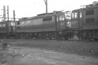 Three class EM1 electric locomotives 26027, 26001 and 26025 stand in the locomotive sidings alongside Wath marshalling yard in October 1962 ready to take out coal trains via Woodhead.<br>
<br><br>[K A Gray 07/10/1962]