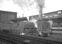 Britannia Pacific no 70032 <I>Tennyson</I> about to leave Carlisle on 30 January 1965 with the mid morning ex-Glasgow Central / Edinburgh Princes Street train for Birmingham New Street.<br><br>[K A Gray 30/01/1965]