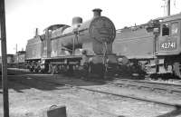 Fowler 4F 0-6-0 no 44011 in the shed yard at Greenock Ladyburn in 1960, with just over 2 years to go before withdrawal from Polmadie in October 1962.  <br><br>[K A Gray //1960]