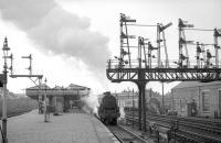 Black 5 no 45478 about to pull away from the platform at Carstairs with a service for Edinburgh Princes Street around 1965. The locomotive's home shed, stands on the right.<br><br>[Robin Barbour Collection (Courtesy Bruce McCartney) //1965]