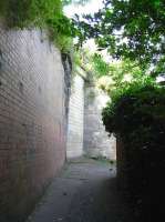 The bricked-up subway that led from Christian Path on the south side of the ECML to the island platform of Portobello station. June 2009.<br><br>[David Panton 03/06/2009]