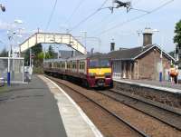 320 318 pulls into Cardross on a service for Drumgelloch on 2 June 2009. Most unusually for the SPT network the station building is original.<br><br>[David Panton 02/06/2009]