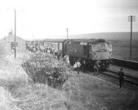 The GNSR <I>Formartine and Buchan Excursion</I>, with D5323 in charge, makes a scheduled photo-stop at Longside station on 25 May 1969.<br><br>[A Snapper (Courtesy Bruce McCartney) 24/05/1969]