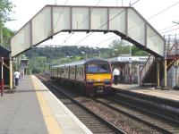 320 306 with an Airdrie service at Anniesland on 2 June 2009.<br><br>[David Panton 02/06/2009]