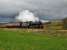 Under a leaden sky 61994 <I>The Great Marquess</I> with  a support coach approaching Kingussie on its way to Inverness. This engine is due to haul a special to Kyle of Lochalsh on Saturday 11/04/09.<br><br>[John Gray 09/04/2009]