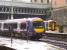 170416 and 158709 at a wet Glasgow Queen Street on 5th May 2009<br><br>[Graham Morgan 05/05/2009]