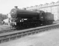 Ex-works J38 no 65908 of Thornton Junction shed stands resplendent in the yard outside Inverurie Works on 29 August 1963. The locomotive was withdrawn by BR in September of the following year. <br><br>[David Pesterfield 29/08/1963]